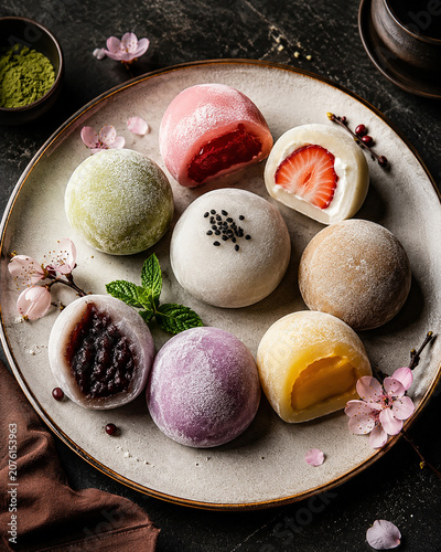 Assorted Mochi Desserts on Ceramic Plate Closeup
