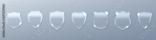 Glass shield with transparent crystal effect and blue glow. Protect your safety with this modern security icon. Perfect for insurance, tech, and digital protection concepts.