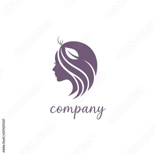 Elegant woman profile logo with flowing hair and leaf.