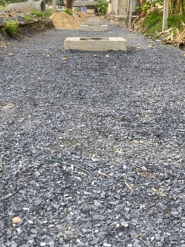 Constructing a road with drainage pipes system for a community