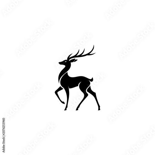 Black vector silhouette illustration of a majestic standing deer with antlers, isolated on a white background