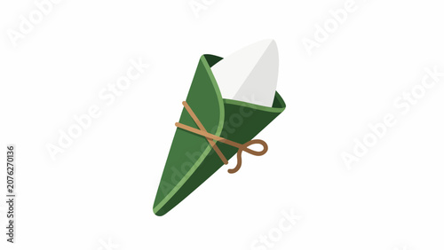 A green origami paper cone tied with string.