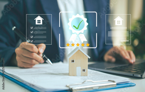 Konstfotografi Property certification review concept with businessperson checking home document