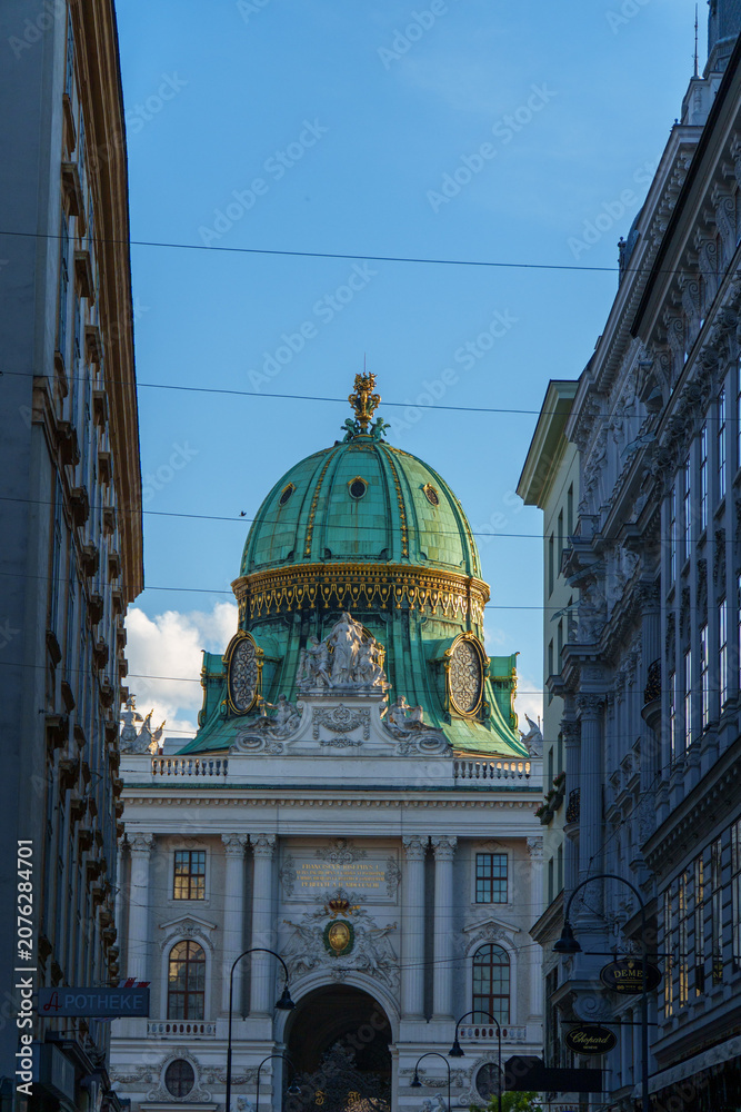 Obraz premium Majestic Dome Of Palace Framed By Historic Urban Buildings In Vienna, Austria