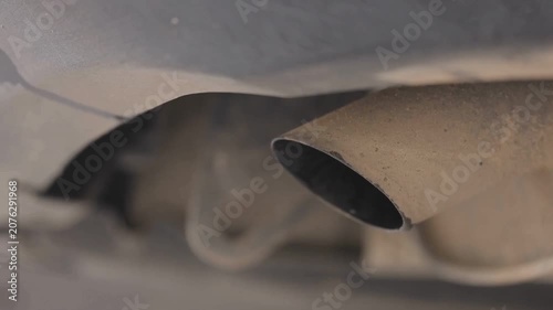 Close Up of Vehicle Exhaust Emissions and Air Pollution