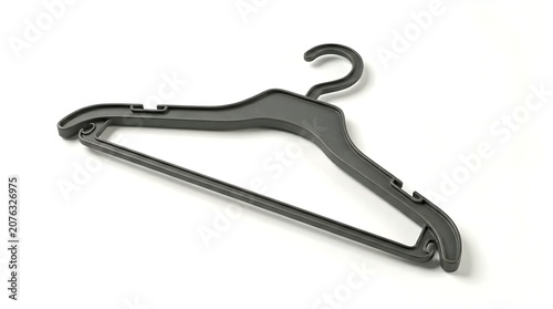 This photograph features a simple plastic clothes hanger presented in isolation on a stark white backdrop It serves as an excellent minimalist mockup for fashion retail and interior design concepts