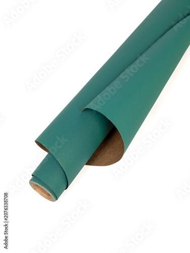 A roll of green paper on a white background