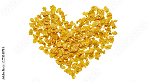 Foto Heart shape made of golden corn flakes cereal