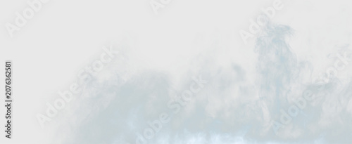 Bild auf Leinwand Clouds form and disperse in a blue sky during a sunny day in a calm landscape, o