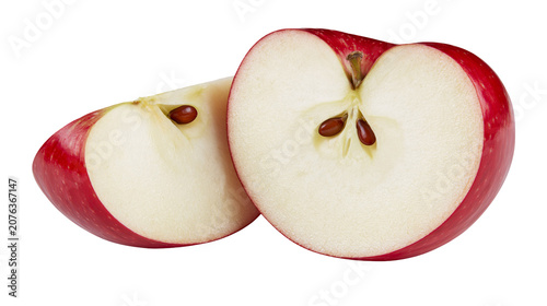 Red apple cut in half showing seeds and white flesh