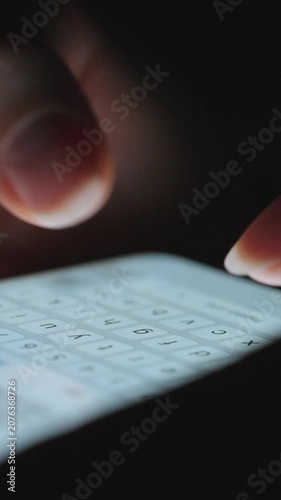 Female hands typing text on smartphone close-up.