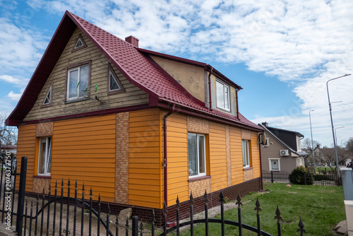Suburban family house with fenced yard