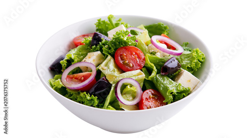Fresh salad with lettuce tomatoes olives red onion, and feta cheese in a bowl
