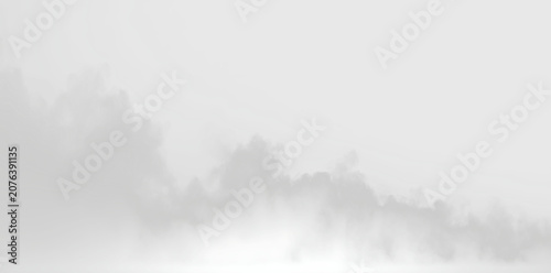 Tableau sur toile Clouds rise and blend in a soft gradient against a clear background at dawn in a