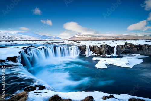Goðafoss waterfall in winter with snow and ice, Iceland