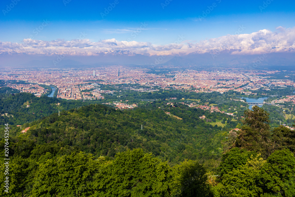 Fototapeta premium Panoramic view of the city of Turin and the Alps from the dome of the Basilica di Superga