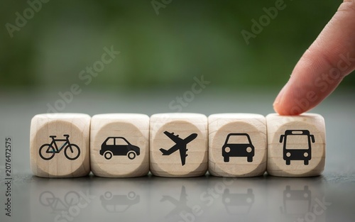 Wooden cubes with transportation icons on blurred background