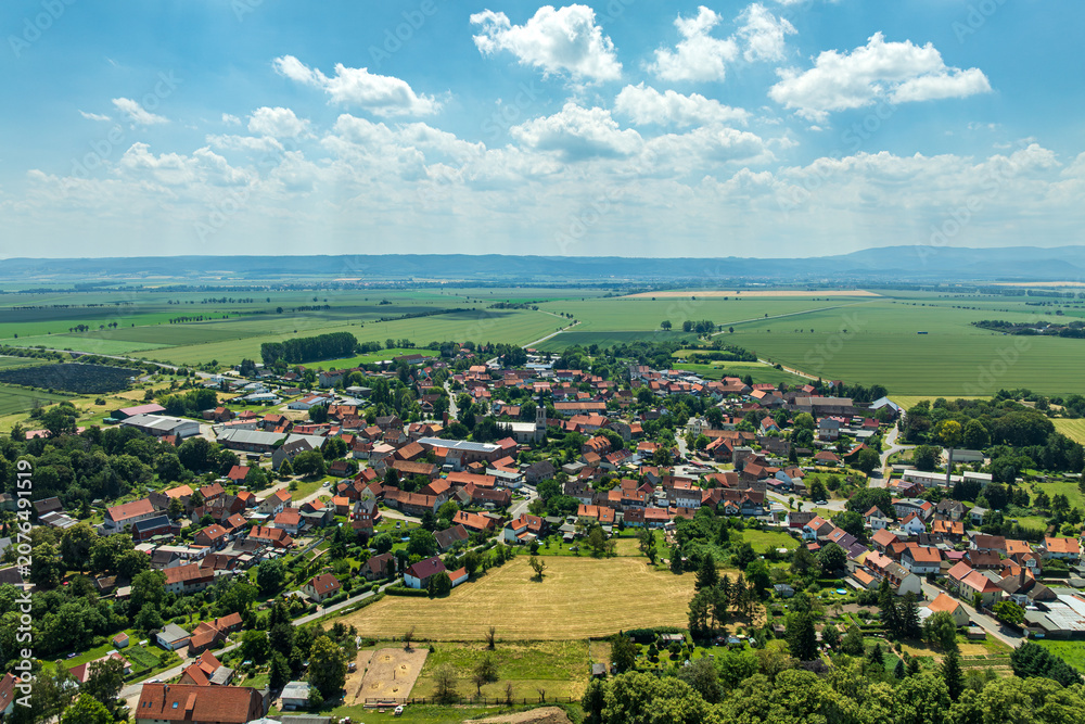 Obraz premium Drone view of Gemeinde Nordharz - Heudeber village in the Harz district, Saxony Anhalt, Germany