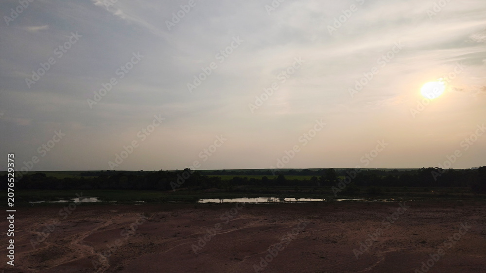 Obraz premium sunset on a dry lake