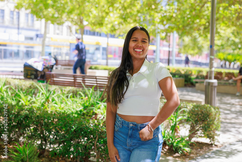Smiling Female University Student in a Park