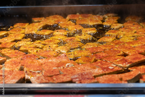 Obraz na plátně Stinky tofu or smelly tofu, popular snack in Chinese street food culture