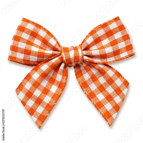 Orange and white gingham checkered hair bow isolated on white background for autumn style.