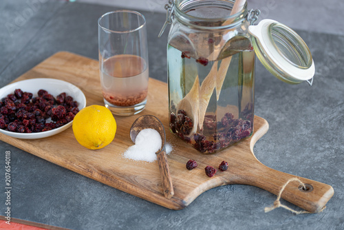 Fermented probiotic healthy water kefir with cranberries - refreshing drink
