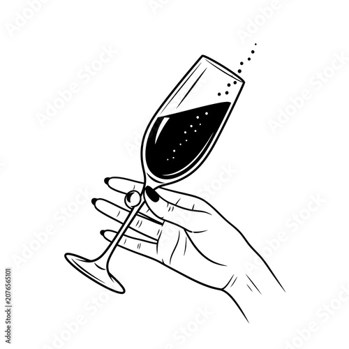 Hand holding a glass of red wine