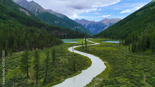 Drone view of the winding Shavla mountain river in the Altai Mountains in summer