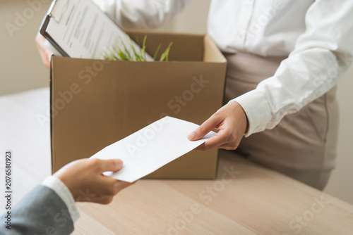 Obraz na plátně Unemployment quitting job, desperate asian young business woman send resignation