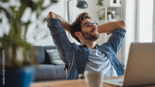 Young adult stretching and resetting during work from home