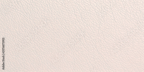 Obraz na plátně Close-up macro shot revealing the intricate texture of a light beige leather surface, showcasing its fine grain and subtle sheen