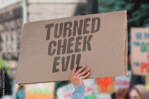 Quadro su tela "Turned cheek evil" Passivity in the face of wrong