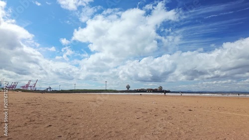 Timelapse of Cargo Ship and Port Cranes at Crosby Beach