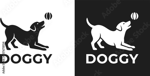 Black and white dog catching ball