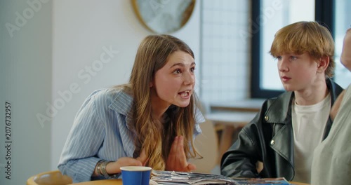 Teenage students in heated group discussion