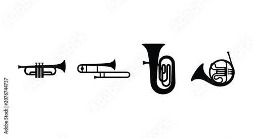 Foto Four brass musical instruments depicted as a black silhouette against a white ba