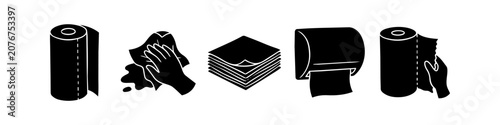 Black silhouette icons of paper towels, napkins, a dispenser, and hands wiping spills or tearing sheets. Professional vector set for cleaning and hygiene concepts.
