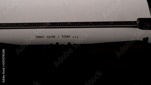 Cuadro en lienzo Typewriter carriage with paper showing the beginning of a story, once upon a time