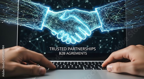 Hands shaking virtually over glowing handshake icon on laptop symbolizing trust, partnership, and successful B2B agreements.