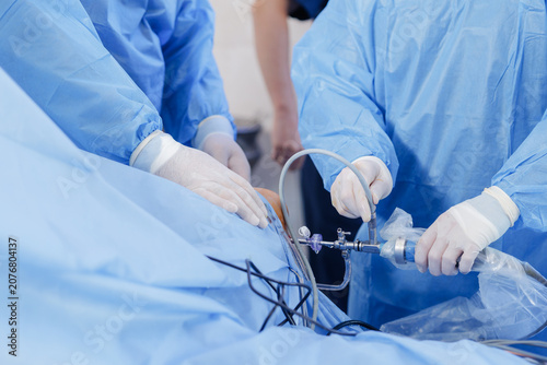 Tableau sur toile Knee Arthroscopy Procedure with Surgical Instruments in Operating Room