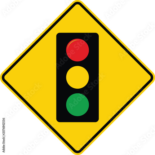 Yellow diamond traffic sign with a traffic light symbol for caution and road safety
