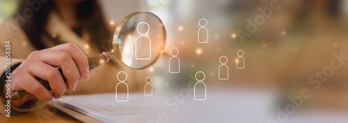 Young businesswoman holding magnifying glass Career managers looking for employees or candidates, HR recruiting, isometric managers looking at each businessman with a magnifying glass, banner style
