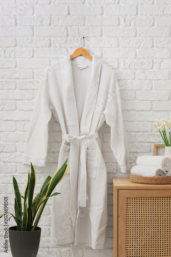 Waffle bathrobe hanging on ...