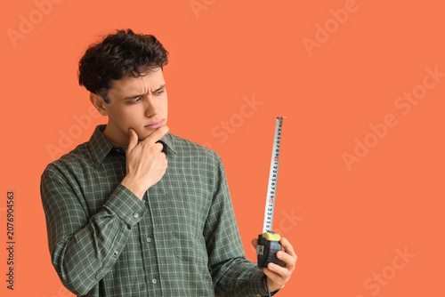Thoughtful young man with t...