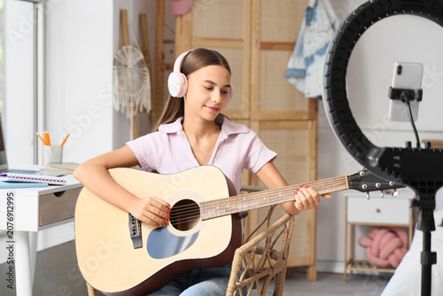 Teenage girl with headphone...