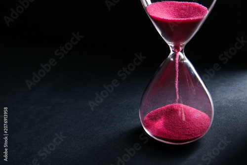 Hourglass with pink crystal...