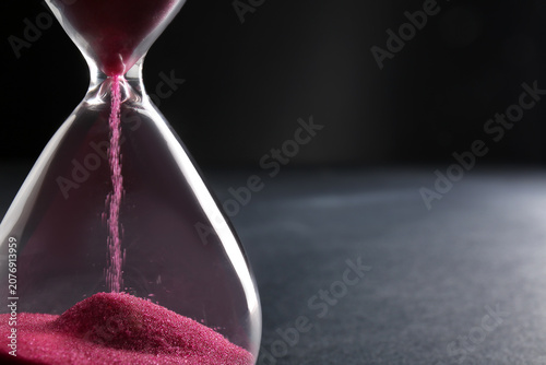 Hourglass with pink crystal...