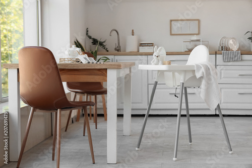 Baby highchair with bottle ...