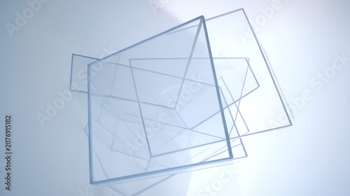 Abstract composition of transparent geometric shapes on a light blue background